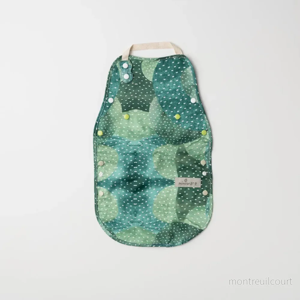 Catch & Cover – haklapp/förkläde 2-i-1 (Prickly Pear) Catch & Cover – haklapp/förkläde 2-i-1 (Prickly Pear)